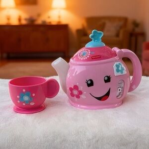FISHER PRICE MUSICAL LAUGH & LEARN TEA POT WITH One CUPS  Cute! Works!